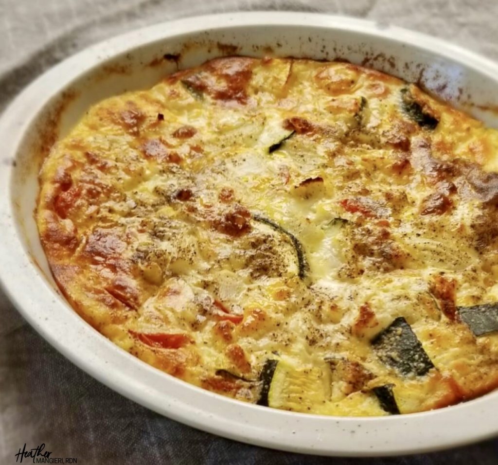 Make a zucchini and tomato crustless pie with your fresh zucchini vegetable