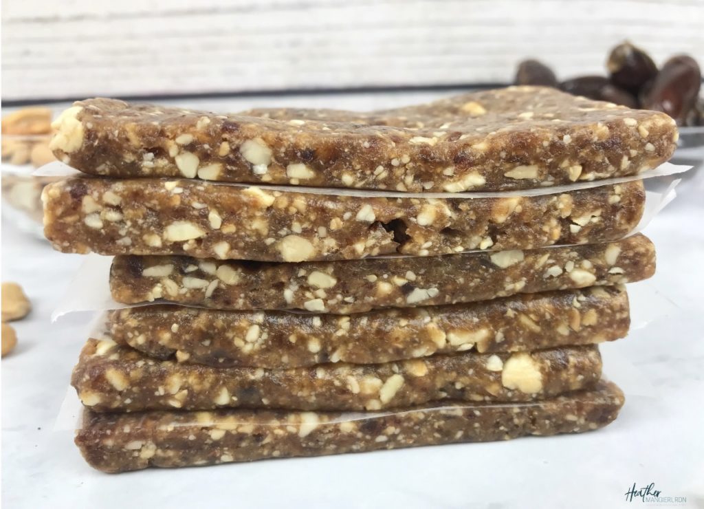 These homemade fruit and nut bars were inspired by my love for the cashew-cookie flavored LaraBar. They are the perfect snack to take with you on a hike or bike ride or to satisfy a mid-day sweet tooth