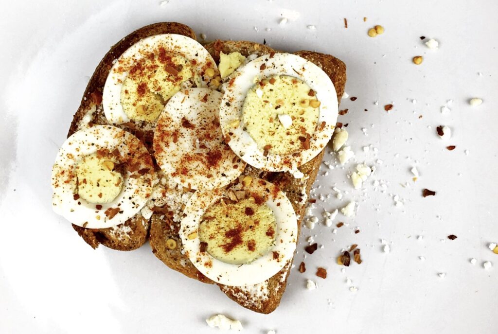 Top toast with a hard-boiled egg for a quick breakfast