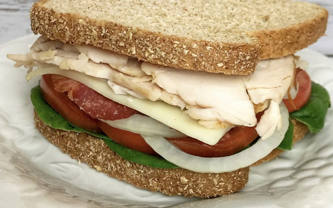 Sandwiches are a perfect solution for a busy families meal planning problems. I’m sharing how to build a balanced sandwich- from choosing the bread and protein to the vegetables and condiments. I’m also sharing the calories and nutrition facts for my favorite sandwich – turkey, bacon and cheese on light wheat bread.