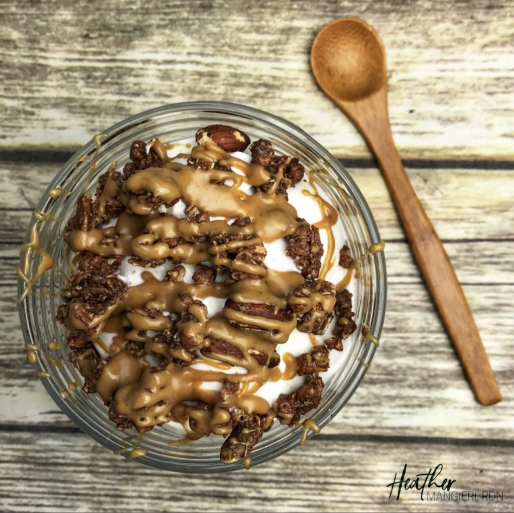Vanilla Flavored Topped with Chocolate Granola, Almonds and Drizzles with Warm Peanut Butter