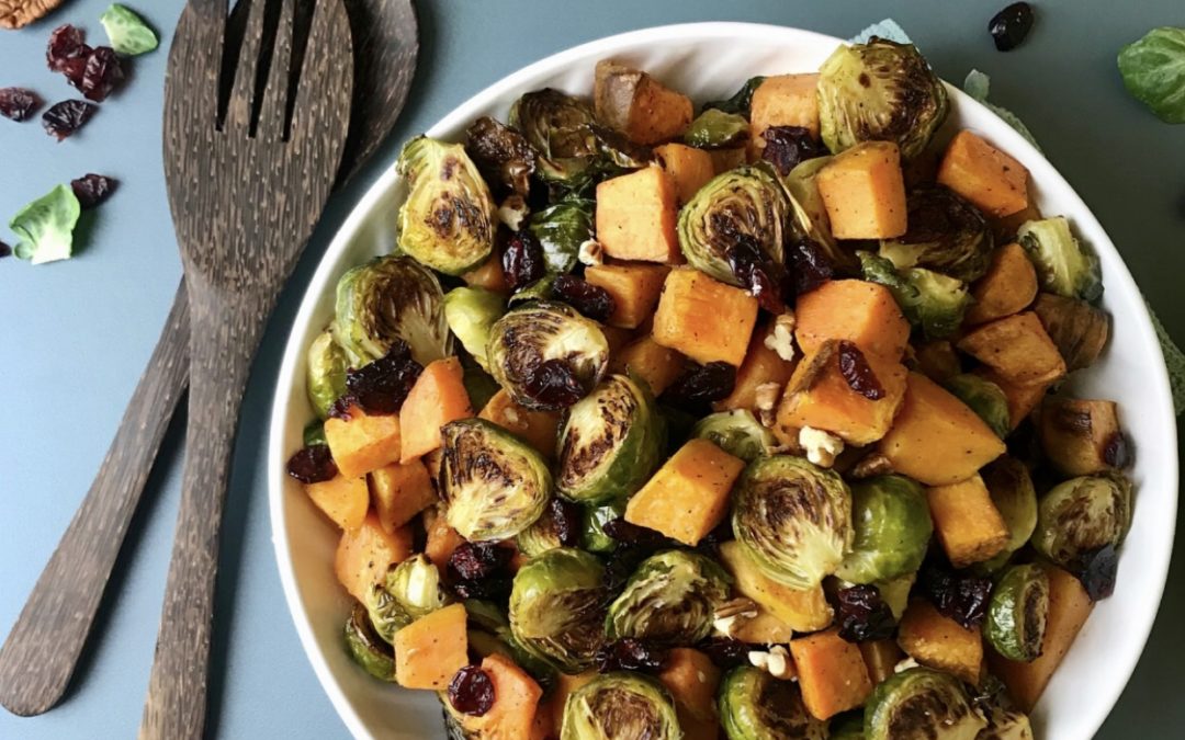 These sweet and savory sweet potatoes and Brussels sprouts with maple glaze are topped with cranberries and pecans, making them the perfect side dish for your Thanksgiving celebration.