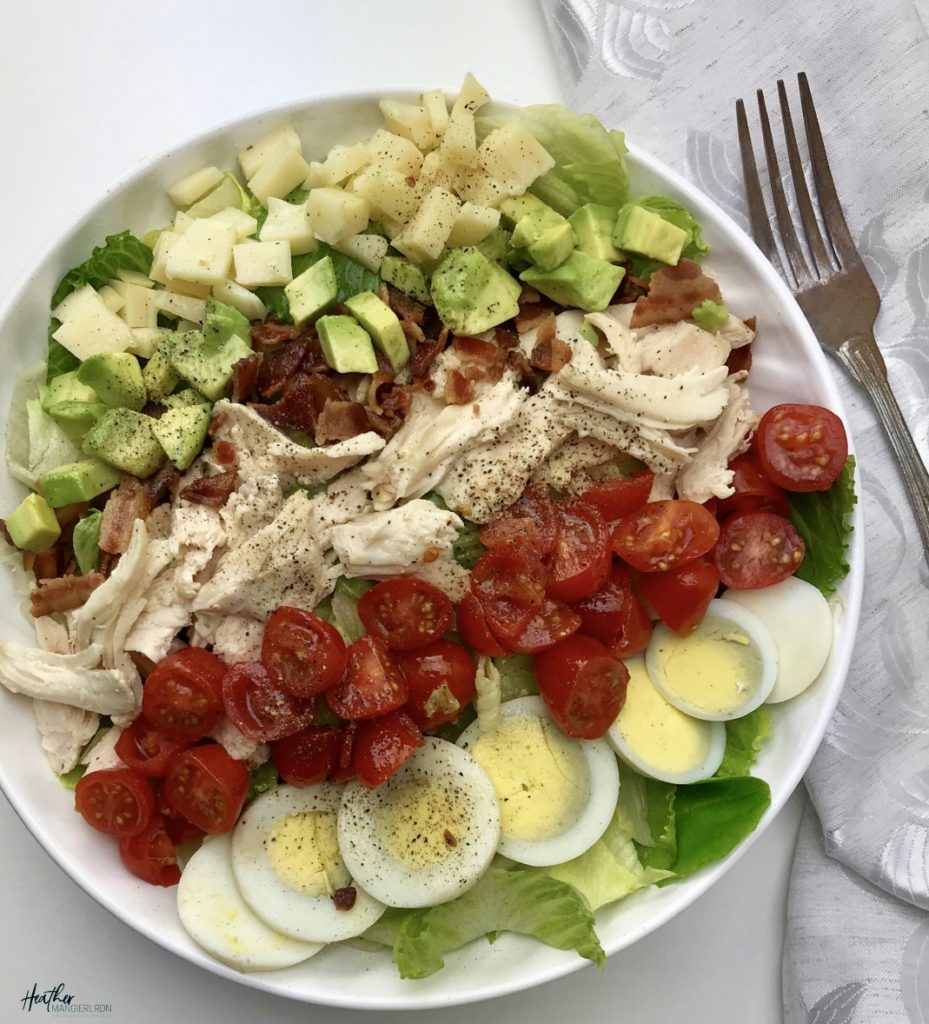 This modified classic cobb salad is packed with protein and nutrients, and portioned with ingredients to make a healthy quick and easy  meal.