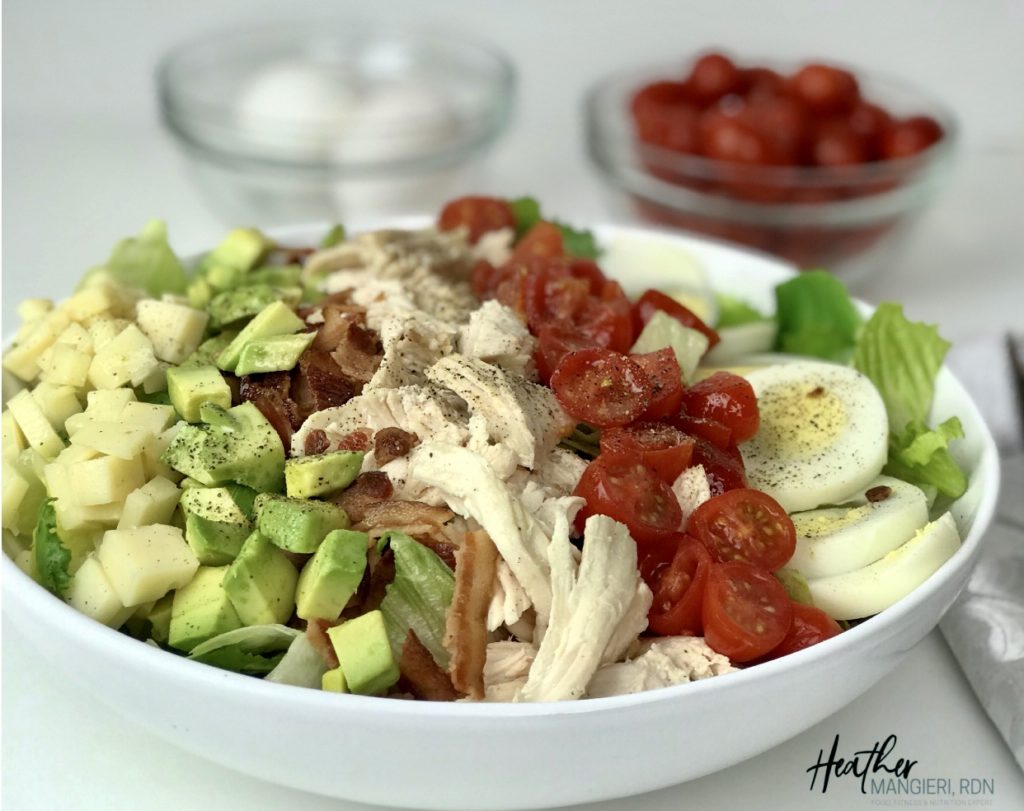 This modified classic cobb salad is packed with protein and nutrients, and portioned with ingredients to make a healthy quick and easy meal.