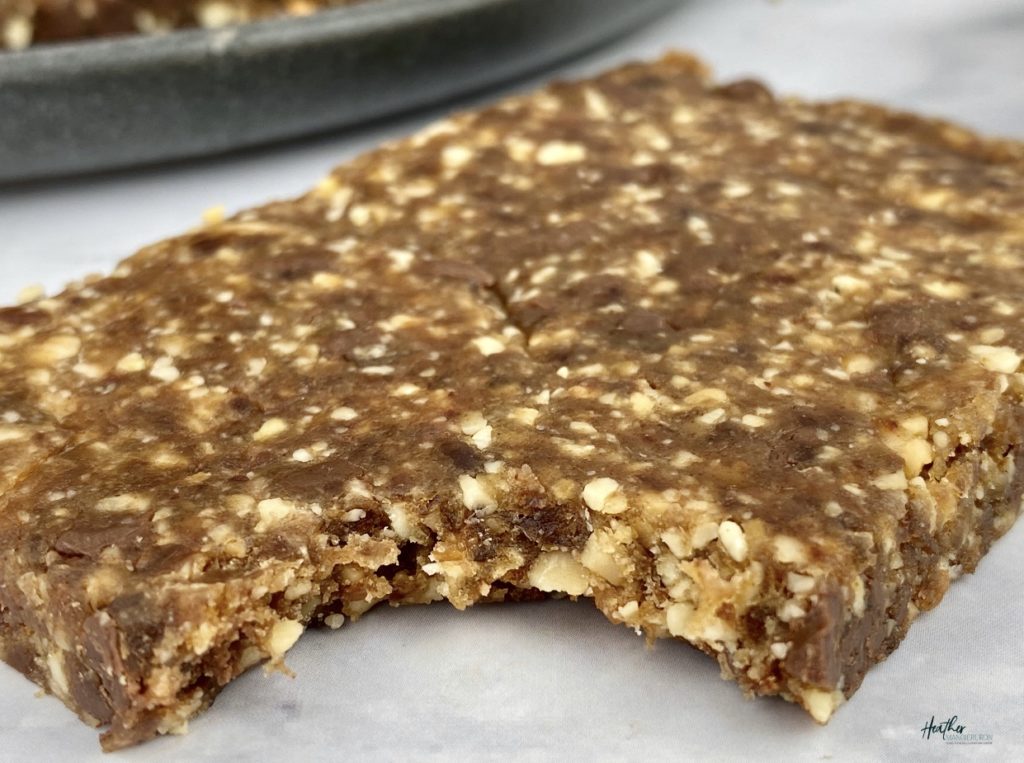 Up-close photo of no-bake chocolate and peanut butter fruti and nut bar.jpg