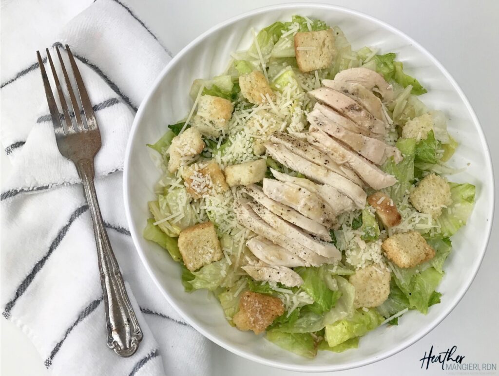 A healthier grilled chicken Caesar salad with 340 calories, 15 grams of fat and portion controlled to provide a healthy, balanced meal