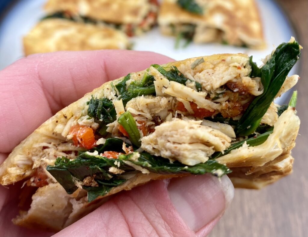 This crispy, flavor-filled chicken and spinach quesadilla is packed with nutrition and takes under 10 minutes to make! It’s a delicious and easy way to get more greens, protein, fiber, calcium and iron in your diet!
