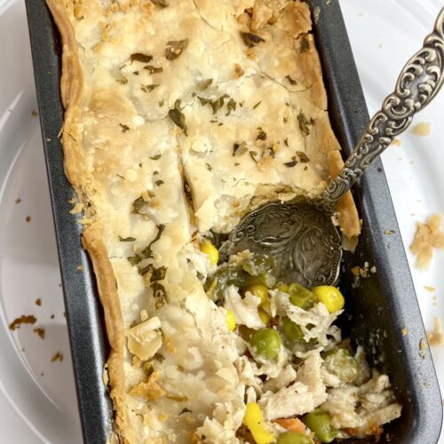 This healthier chicken pot pie recipe is modified from traditional recipes to provide fewer calories, fat and sodium while delivering the same creamy, flavorful taste you expect from this comfort food. It’s made in individual, single-serve portions so everyone is sure to get their fair share of veggies and protein!