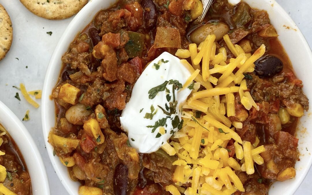 This healthier, vegetable-packed beef chili is made with lean beef, two different types of beans and four different vegetables for a hearty, nutrition-packed