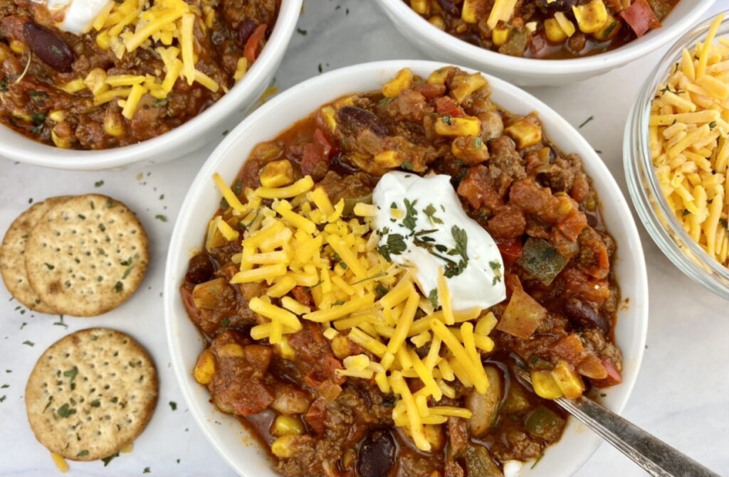 This healthier, vegetable-packed beef chili is made with lean beef, two different types of beans and four different vegetables for a hearty, nutrition-packed meal