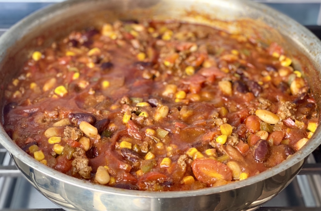 This healthier, vegetable-packed beef chili is made with lean beef, two different types of beans and four different vegetables for a hearty, nutrition-packed 