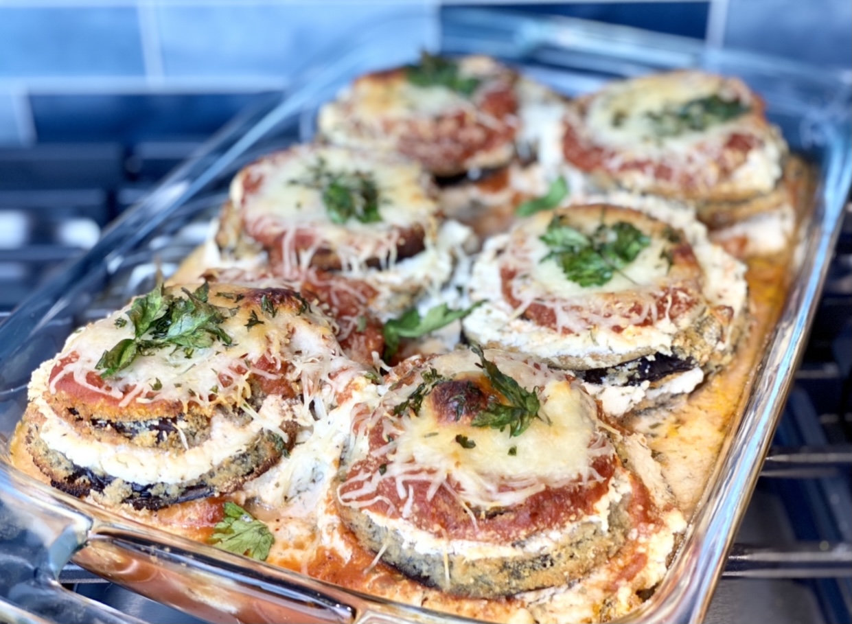 If you’re looking for a lower calorie version of your favorite eggplant parmesan, this easy, healthier baked eggplant parmesan is it! This recipe is made with minimal ingredients, part-skim and reduced fat dairy products and portion controlled so you get the same flavor and protein content as traditional recipes without as many calories or fat.