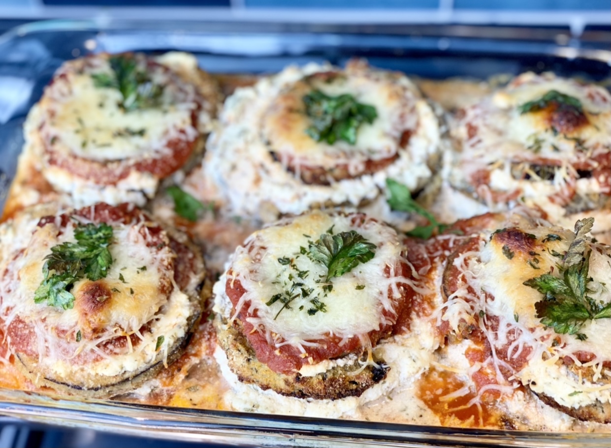 If you’re looking for a lower calorie version of your favorite eggplant parmesan, this easy, healthier baked eggplant parmesan is it! This recipe is made with minimal ingredients, part-skim and reduced fat dairy products and portion controlled so you get the same flavor and protein content as traditional recipes without as many calories or fat.