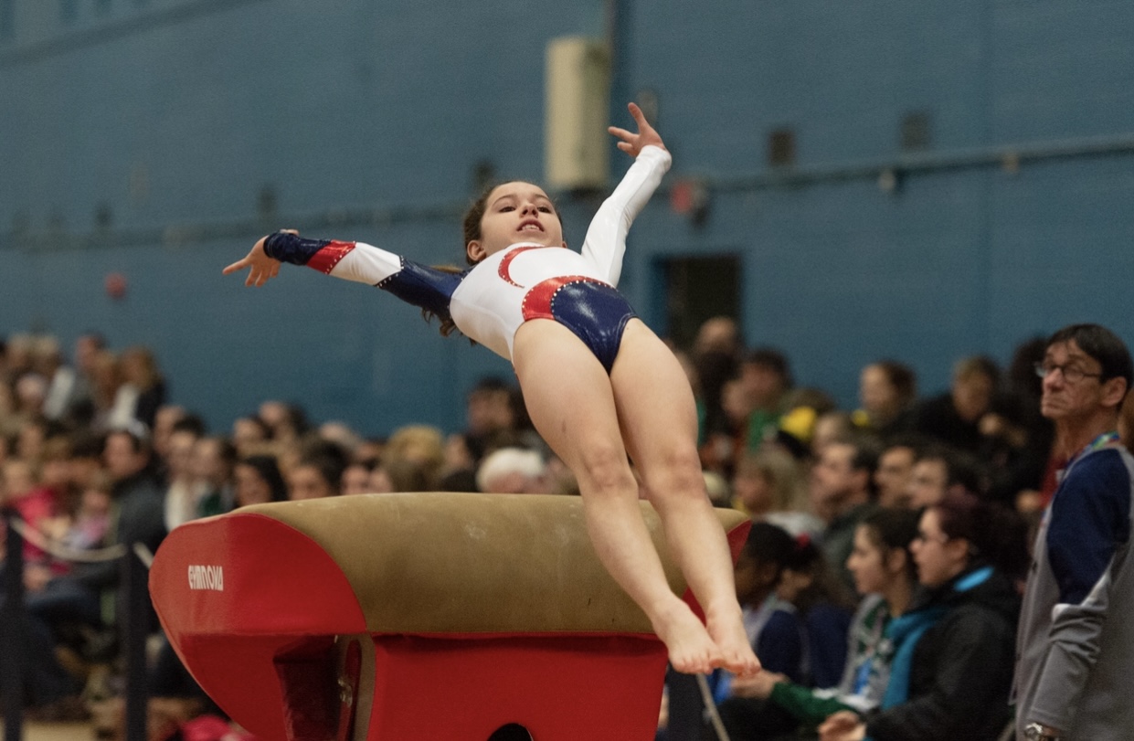 Photo of a gymnast, which is considered a lean sport at risk for disordered eating